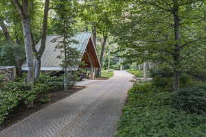 View of property's community featuring driveway