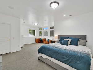 Bedroom #4 carpeted bedroom with built in desks and walk-in closet