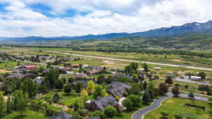 Aerial perspective of suburban area with mountains