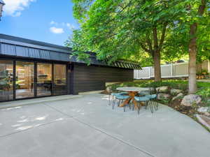 View of patio with outdoor dining space