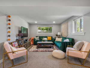 Living room featuring plenty of natural light and recessed lighting