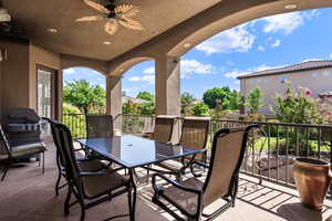 View of patio featuring ceiling fan and outdoor dining space