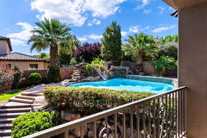 View of pool with a fenced backyard