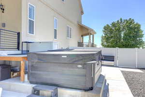 View of patio / terrace featuring a hot tub