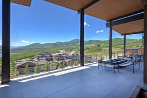 Patio / terrace featuring a mountain view