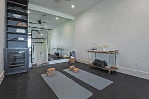 Exercise room with recessed lighting and ceiling fan