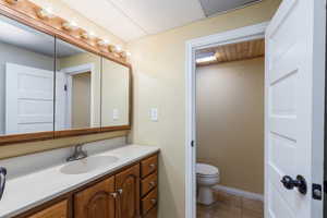 Bathroom featuring vanity and tile patterned flooring