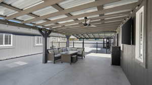 View of patio featuring an outdoor hangout area