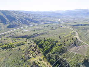 Aerial overview of property's location with mountains