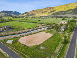 View of mountain background featuring rural landscape