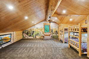 Carpeted bedroom featuring wood ceiling and recessed lighting