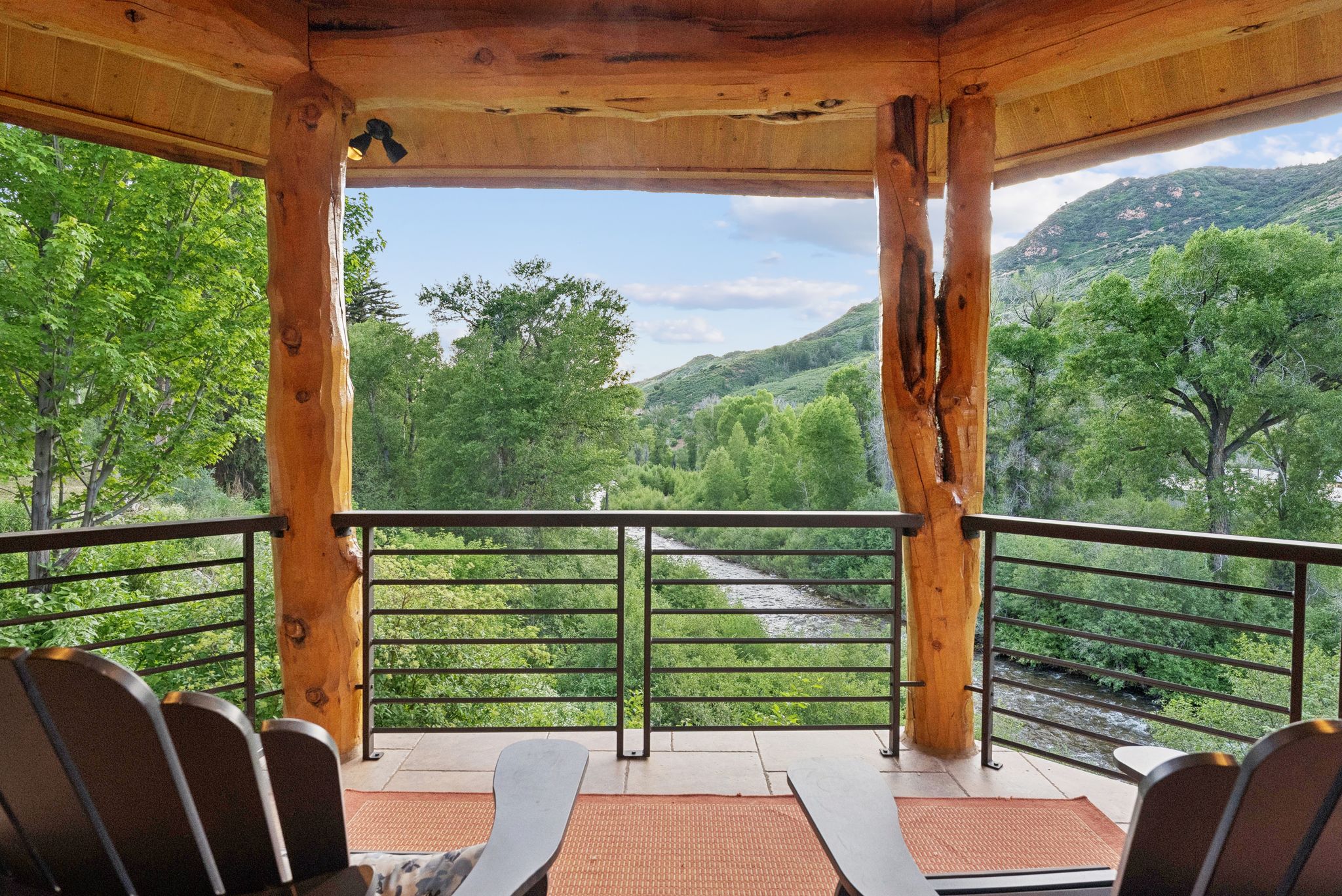 Master bedroom balcony with a mountain view