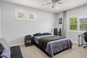 Bedroom featuring carpet floors, recessed lighting, and ceiling fan
