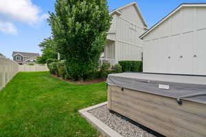 View of yard featuring a hot tub