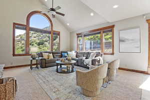 Family Room featuring high vaulted ceiling, recessed lighting, and a ceiling fan