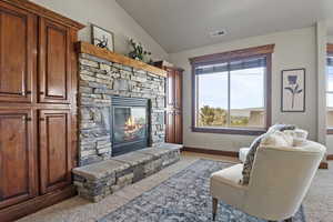 Primary Bedroom with built in cabinets and fireplace