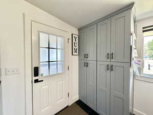 Gorgeous cabinetry with black hardward.  Extra storage!