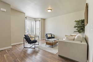 Living area with wood finished floors