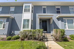 Townhome / multi-family property with stucco siding