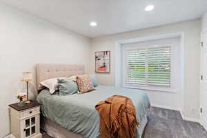Bedroom with carpet and recessed lighting