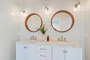 Full bathroom with double vanity