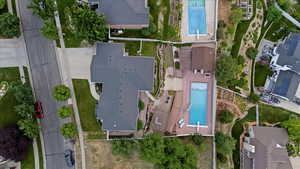 Aerial overview of property's location featuring a pool