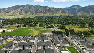 View of mountain background featuring nearby suburban area