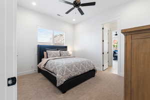 Bedroom featuring light carpet, multiple windows, recessed lighting, and ceiling fan