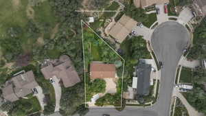 Aerial perspective of suburban area with property parcel outlined