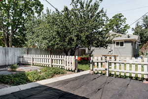 View of patio / terrace with a fenced front yard