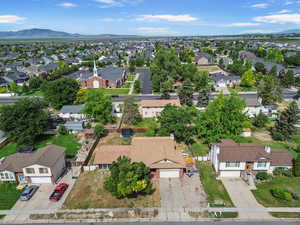Aerial view of residential area featuring mountains