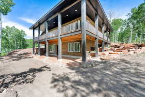 View of property exterior featuring a deck