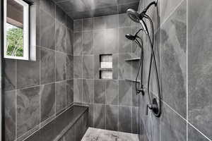 Bathroom with tiled shower