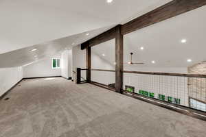 Additional living space with lofted ceiling, carpet, recessed lighting, and a ceiling fan