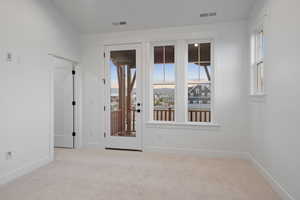 Spare room with carpet floors