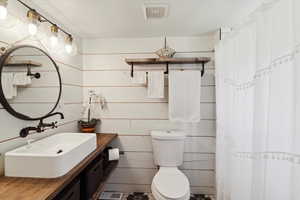 Main level custom full bathroom.