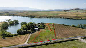 View of property location with a water and mountain view and property parcel outlined