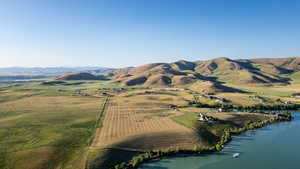 Mountain view with rural landscape and a large body of water