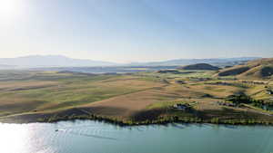 Aerial overview of property's location with a water and mountain view