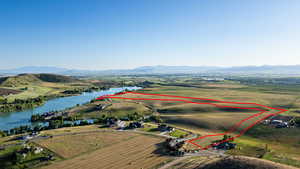 View of property location with a water and mountain view and property parcel outlined