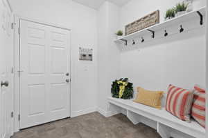Mudroom featuring baseboards