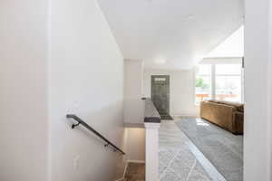 Entryway featuring baseboards and light wood finished floors