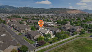 Aerial perspective of suburban area featuring mountains
