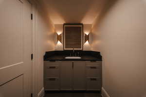 Bathroom featuring vanity and tile patterned floors