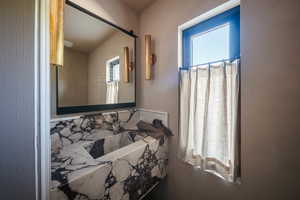 Bathroom featuring plenty of natural light