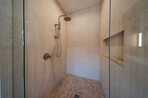 Bathroom with tiled shower