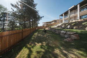View of fenced backyard