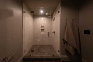 Full bath featuring a stall shower