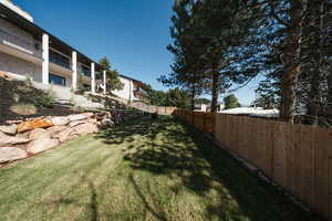 View of fenced backyard