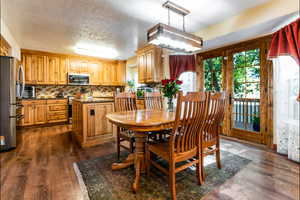 Dining room featuring dark wood finished floors